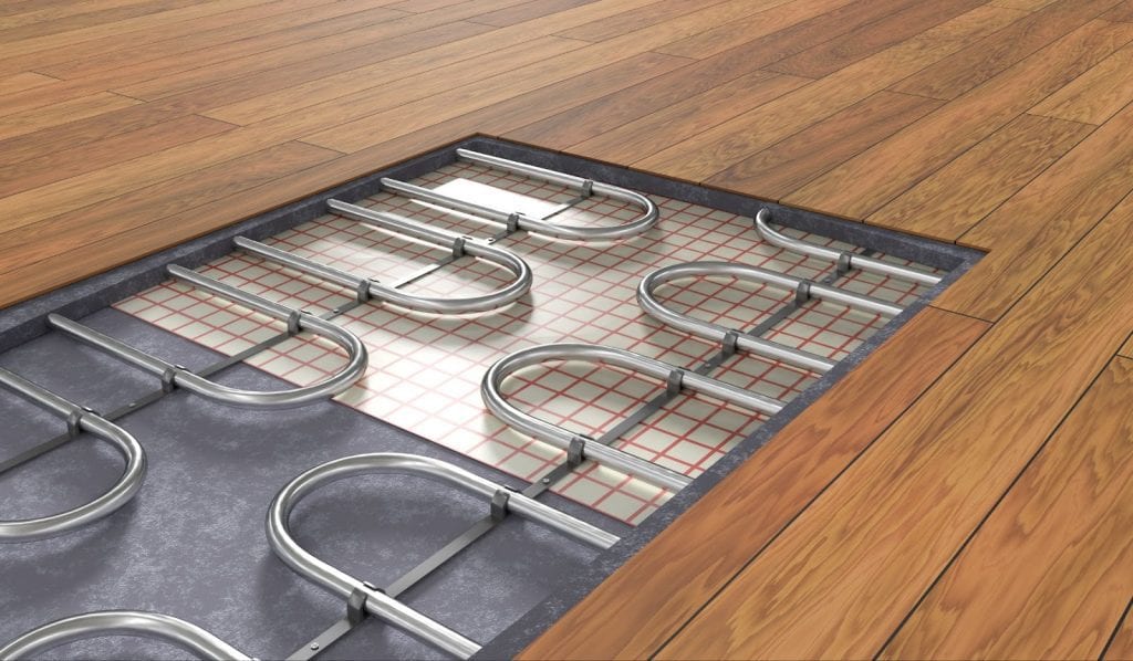 Radiant heating system installed on wooden floor