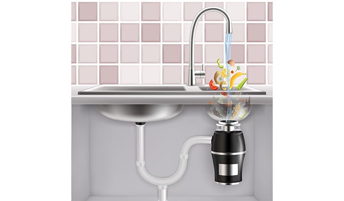A kitchen sink with a drain underneath.