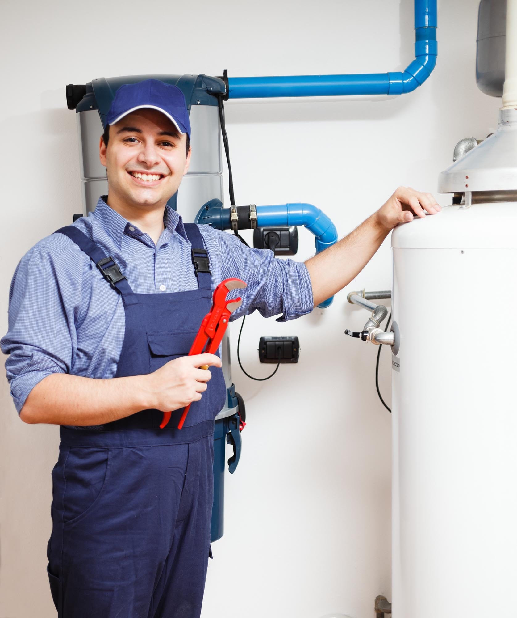Portrait of a smiling plumber at work
