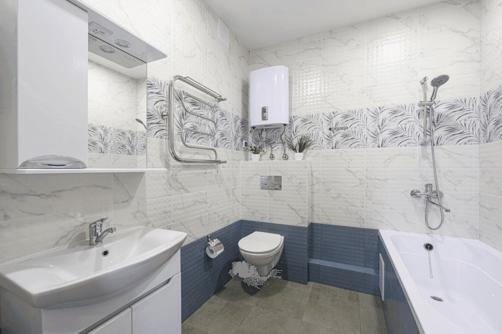 Interior view of a bathroom with a toilet sink and bathtub emphasizing a simple and practical layout