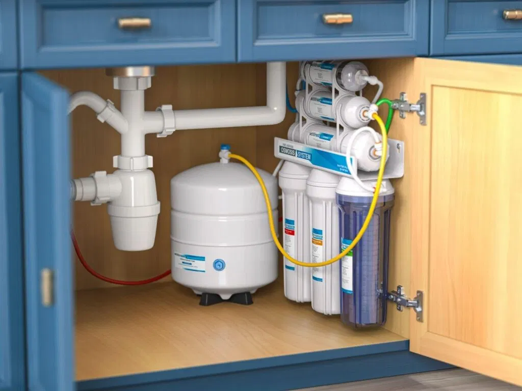 A kitchen sink featuring a water filter and a water dispenser for easy access to filtered water