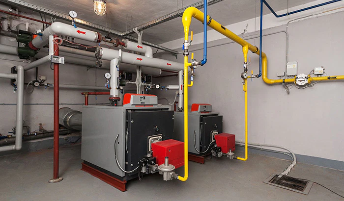 Industrial Room With Pipes And Valves For Commercial Gas Piping And Safety Measures