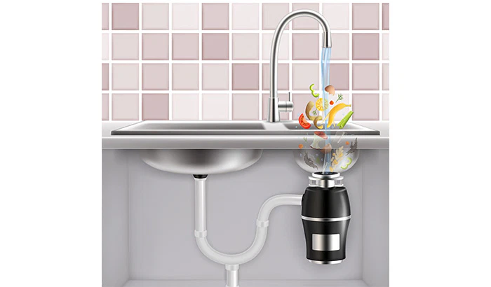 A kitchen sink with a drain underneath.